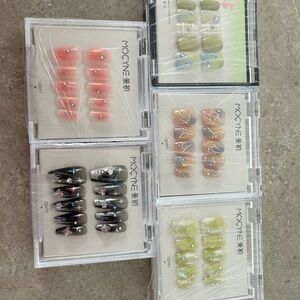 Set of five different MOYNE Nail Art Set with glue